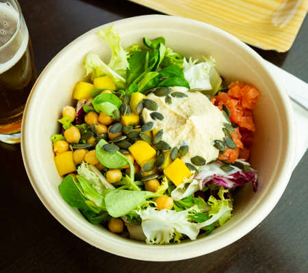 Fish salad with hummus and salmonの写真素材