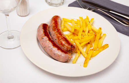 Eastern european cuisine - sausages with potatoesの写真素材