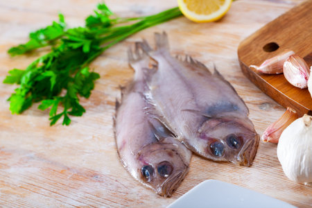 Two whole fresh megrims with seasonings