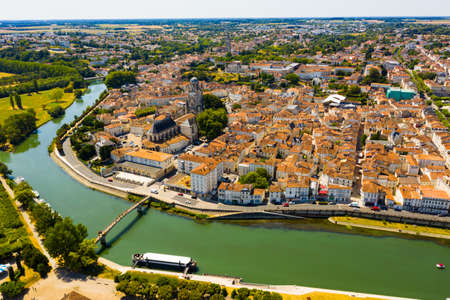 Aerial view of Saintes on Charente river with medieval cathedral, Franceの写真素材
