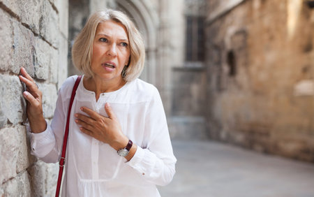 Elderly woman felt bad on city street