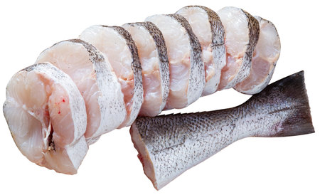 Raw hake sliced, isolated on white