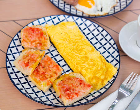 Healthy omelet and sweet jam sandwichesの写真素材