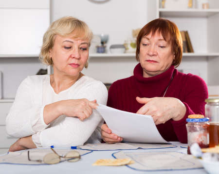 pensioners females with utilities billsの写真素材