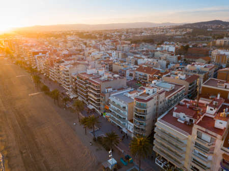 Panoramic aerial view of coast line at Calafell with view of blocks of flatsの写真素材