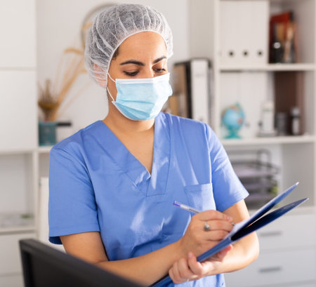 Portrait of woman doctor in mask