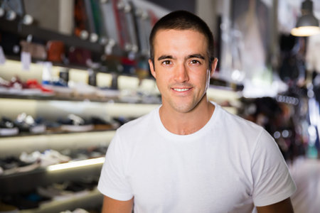 Portrait of young man in store