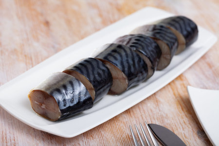 Delicious appetizer - light-salted mackerel on the dining table