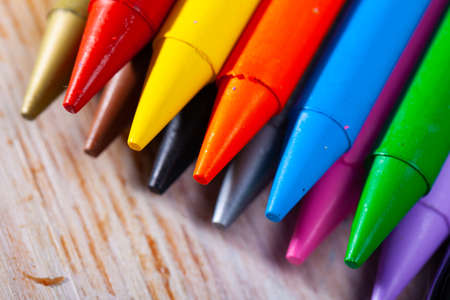 Many various wax crayons on the tableの写真素材