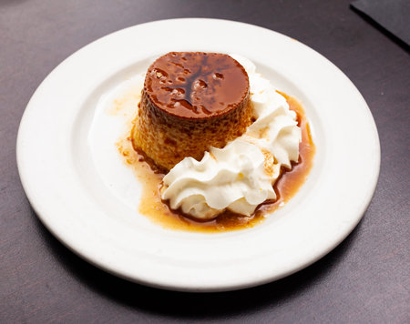 Sweet spanish dessert cream flan with butter cream, nobody