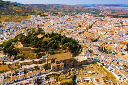 Antequera cityscape overlooking castle and Church of Santa Maria la Mayor, Spain
