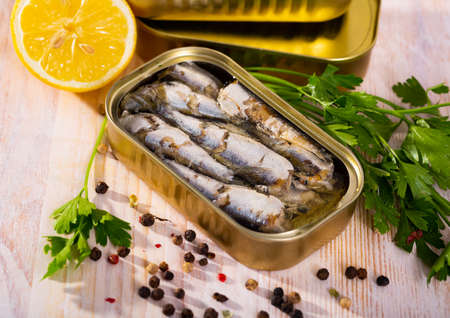 Open can of sardines in oilの写真素材