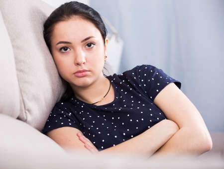 Young disappointed girlの写真素材