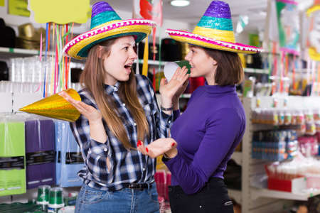 Portrait of cheerful comically dressed girlsの写真素材