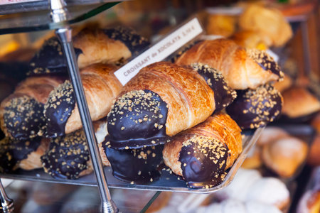 Chocolate croissants, spanish dessert on counter in supermarket