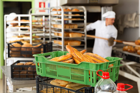 Hot fresh bread in the bakery in box