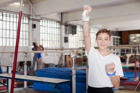 teenage athlete rejoicing at her sporting successの写真素材