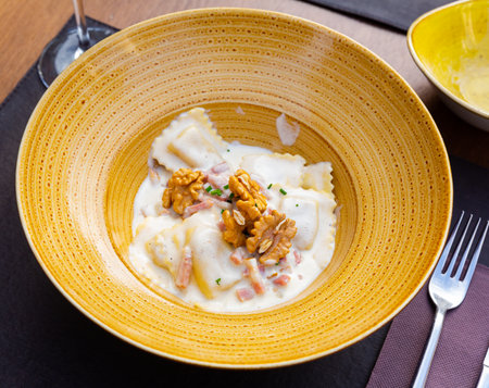 Raviolini pasta with goat cheese and walnutsの写真素材