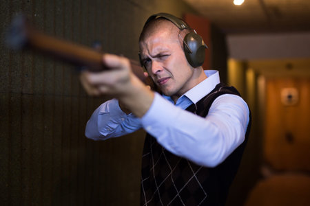 Man shoots semi-automatic rifle at shooting range