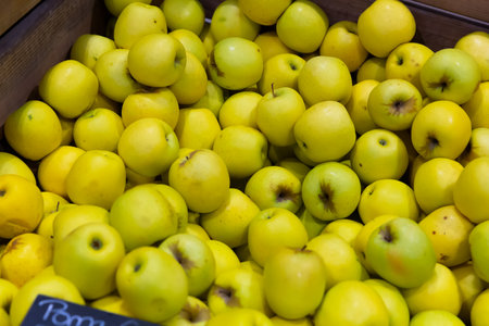 Closeup view on ripe apples on the marketの写真素材
