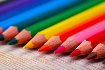 Colorful pencils on wooden tableの写真素材