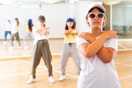 Teenage girl hip hop dancer during classの写真素材