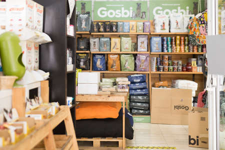 Barcelona, Spain - November 25, 2020: Assortment of pet feed for sale on shelves in pet shopのeditorial素材
