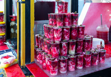 Traditional Turkish pickled vegetables in sour brine Tursu suyu in street market