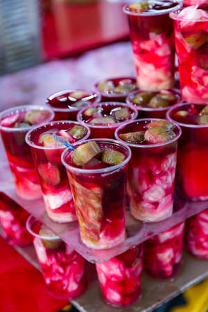 Turkish pickled vegetables in sour brine Salgam or Tursu for saleの写真素材