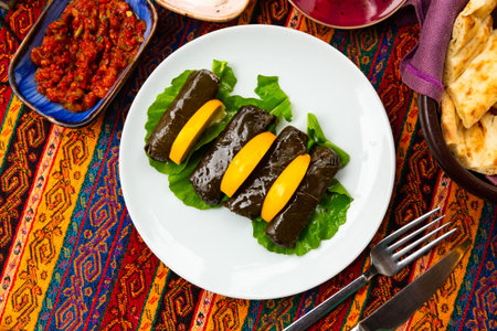 A Turkish snack wrapped in grape leaves is called Yaprak Sarma.