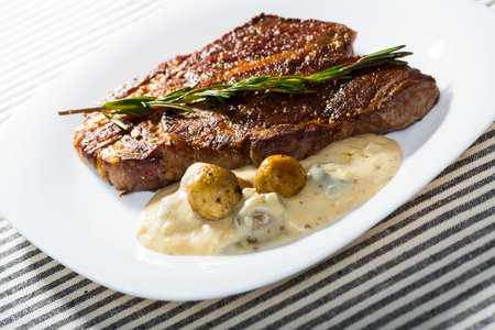 Image of beef entrecote with mushroom sauceの写真素材