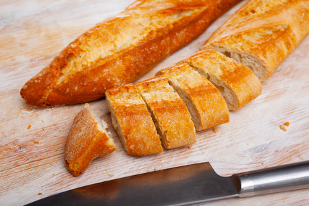 French loaves with chopped slicesの写真素材