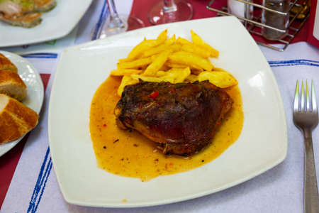 Fried pork with potatoesの写真素材