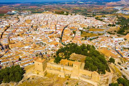 Antequera cityscape overlooking castle and Church of Santa Maria la Mayor, Spainの写真素材