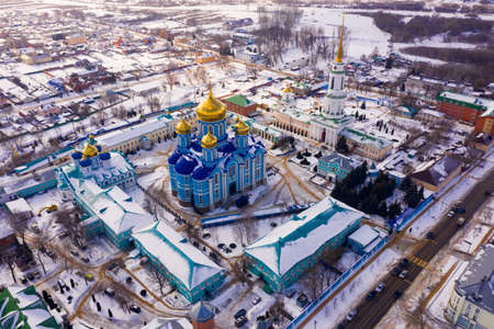 Aerial view of the Nativity-Bogoroditsky monastery surrounded by residential buildings in Zadonskの写真素材