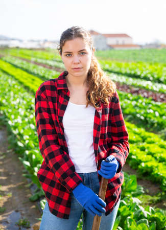 Portrait of a young french woman with hoeの写真素材