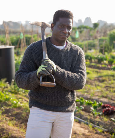 Portrait of american male gardener with shovelの写真素材