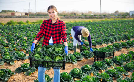 Portrait of cheerful young professional female farmerの写真素材