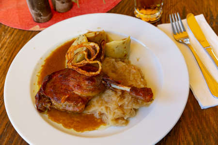 Confit du canard in czech with sauerkraut and potato dumplingsの写真素材