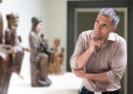 Adult male is visiting at the expositionの写真素材