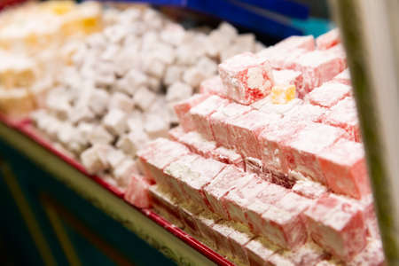 Turkish lokum with nougat, fruits and pistachios for saleの写真素材
