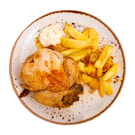 chicken with baked potatoesの写真素材