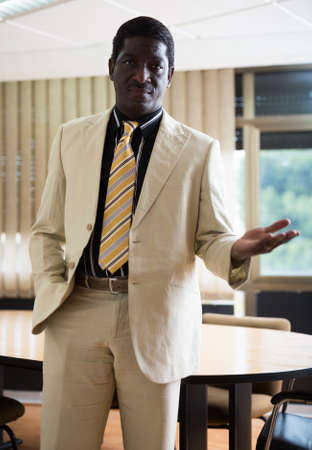 Portrait of successful and confident male businessman in officeの写真素材