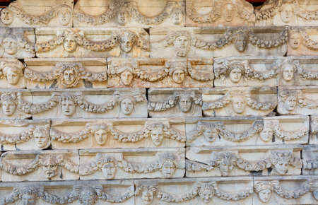 Bas-reliefs in the form of masks in Aphrodisias, Turkeyの写真素材
