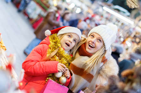 Family shopping on Christmas marketの写真素材