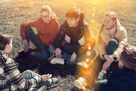 Portrait of teenagers on the summer lawn