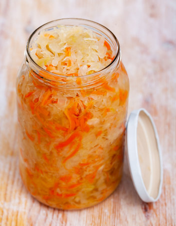 Glass jar with shredded fermented cabbageの写真素材