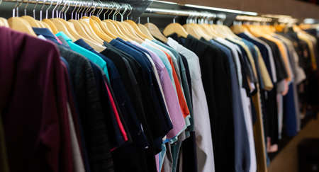 Men clothes in modern garments shopの写真素材