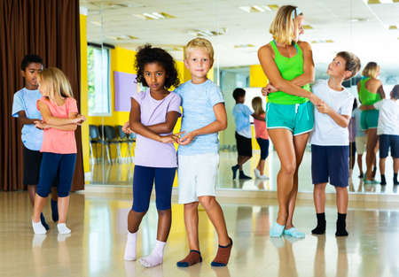Preteen kids training in dance studioの写真素材