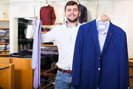 owner guy displaying jacketの写真素材